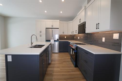 720 St. Mary River Drive, Kimberley, BC - Indoor Photo Showing Kitchen With Stainless Steel Kitchen With Double Sink With Upgraded Kitchen