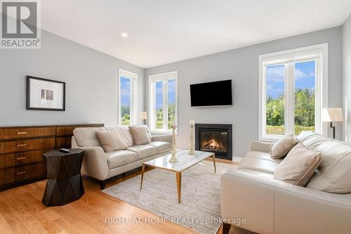 676 Fisher Street, North Grenville, ON - Indoor Photo Showing Living Room With Fireplace