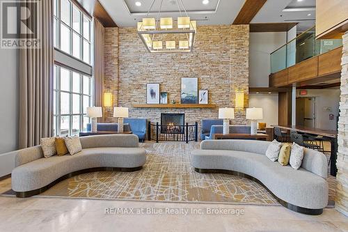 377 - 220 Gord Canning Drive, Blue Mountains (Blue Mountain Resort Area), ON - Indoor Photo Showing Living Room With Fireplace