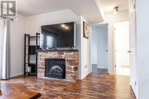 80 Burnham Court, Stratford, ON - Indoor Photo Showing Living Room With Fireplace