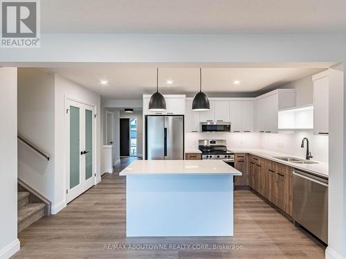 64 Canary Street, Tillsonburg, ON - Indoor Photo Showing Kitchen With Stainless Steel Kitchen With Double Sink With Upgraded Kitchen