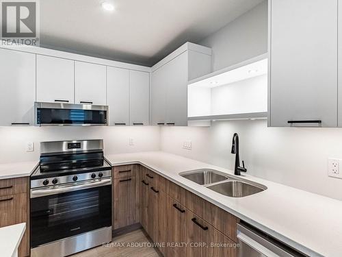 64 Canary Street, Tillsonburg, ON - Indoor Photo Showing Kitchen With Double Sink With Upgraded Kitchen