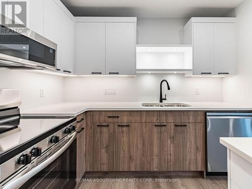 64 Canary Street, Tillsonburg, ON - Indoor Photo Showing Kitchen With Stainless Steel Kitchen With Double Sink With Upgraded Kitchen