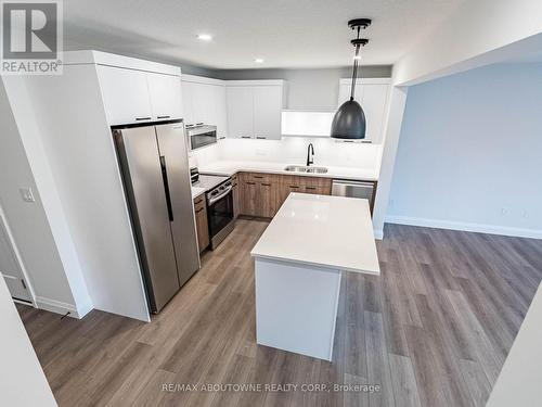 64 Canary Street, Tillsonburg, ON - Indoor Photo Showing Kitchen With Stainless Steel Kitchen With Double Sink