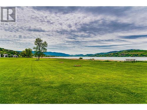 Picnic tables and games area to use and walk your pets - 8000 Highland Road Unit# 153, Vernon, BC 