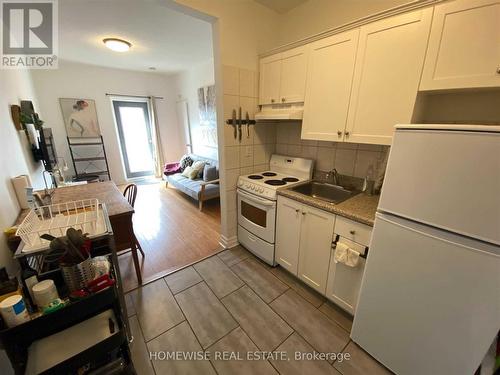 207 - 1 Triller Avenue, Toronto, ON - Indoor Photo Showing Kitchen