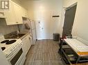 207 - 1 Triller Avenue, Toronto, ON  - Indoor Photo Showing Kitchen 