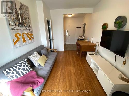 207 - 1 Triller Avenue, Toronto, ON - Indoor Photo Showing Living Room