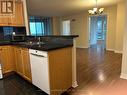 1005 - 7 Lorraine Drive, Toronto, ON  - Indoor Photo Showing Kitchen With Double Sink 