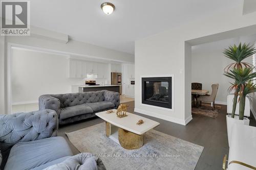 636 Leatherleaf Landing, Milton, ON - Indoor Photo Showing Living Room With Fireplace