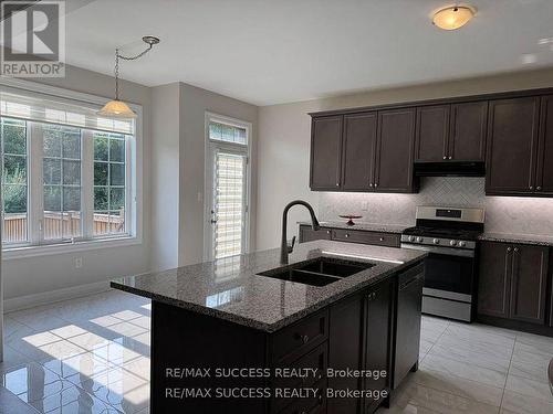 588 Queen Mary Drive, Brampton, ON - Indoor Photo Showing Kitchen With Double Sink