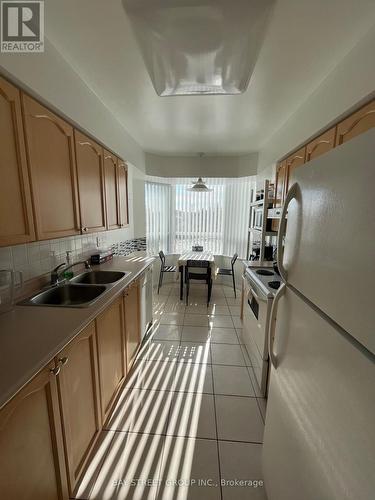 309 - 35 Finch Avenue E, Toronto, ON - Indoor Photo Showing Kitchen With Double Sink