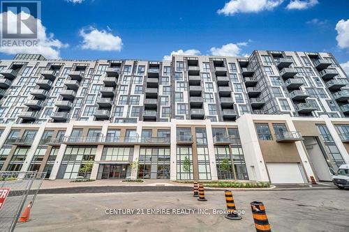 317 - 509 Dundas Street W, Oakville, ON - Outdoor With Balcony With Facade