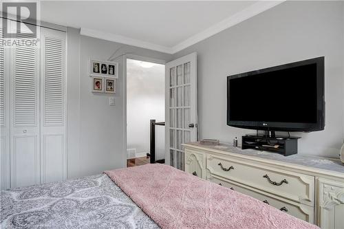 Bedroom featuring a closet and ornamental molding - 220 Salisbury Avenue Unit# 6, Cambridge, ON - Indoor Photo Showing Bedroom