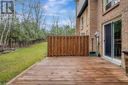 Wooden deck with a lawn - 