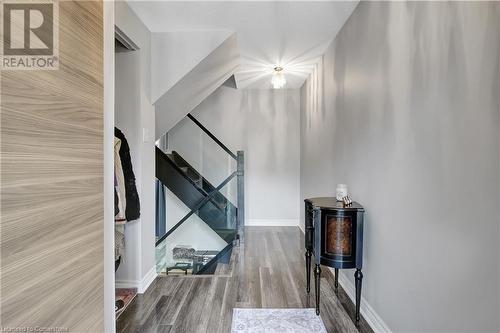 Corridor with wood-type flooring - 220 Salisbury Avenue Unit# 6, Cambridge, ON - Indoor Photo Showing Other Room