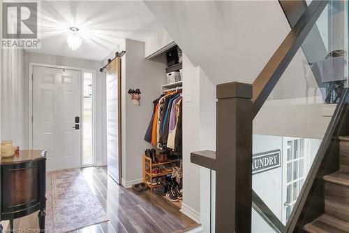 Entryway with a barn door and dark hardwood / wood-style flooring - 220 Salisbury Avenue Unit# 6, Cambridge, ON - Indoor Photo Showing Other Room