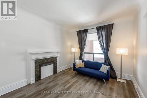 1 - 191 Sherman Avenue S, Hamilton, ON - Indoor Photo Showing Living Room With Fireplace