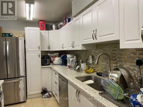 Ph10 - 2050 Bridletowne Circle, Toronto, ON - Indoor Photo Showing Kitchen With Double Sink