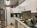 Ph10 - 2050 Bridletowne Circle, Toronto, ON  - Indoor Photo Showing Kitchen With Double Sink 