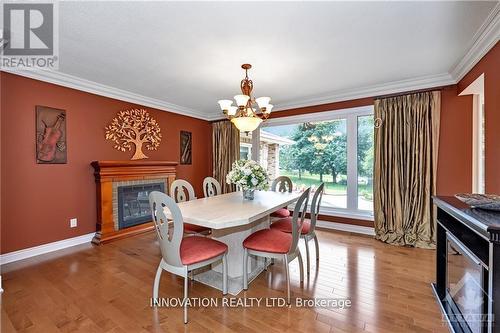 105 Locharron Crescent, Ottawa, ON - Indoor Photo Showing Dining Room With Fireplace