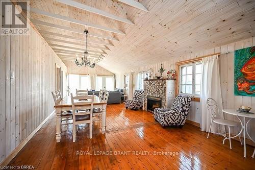 57 Erie Boulevard, Norfolk, ON - Indoor Photo Showing Dining Room With Fireplace