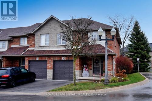 8 - 18 Cedar Street, Grimsby, ON - Outdoor With Facade