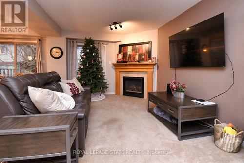 8 - 18 Cedar Street, Grimsby, ON - Indoor Photo Showing Living Room With Fireplace