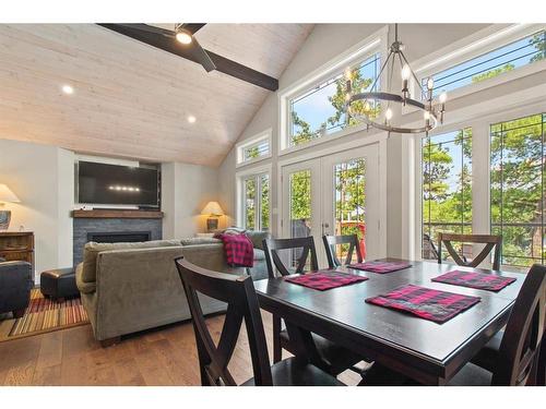 4 Whiskey Jack Way, Kenora, ON - Indoor Photo Showing Dining Room With Fireplace