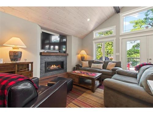 4 Whiskey Jack Way, Kenora, ON - Indoor Photo Showing Living Room With Fireplace