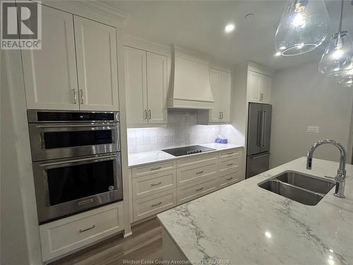 1855 Wyoming Avenue Unit# 305, Lasalle, ON - Indoor Photo Showing Kitchen With Double Sink