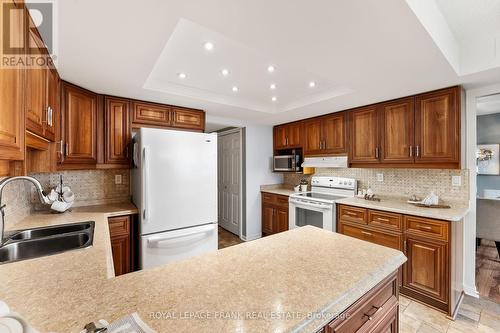 1204 - 900 Wilson Road N, Oshawa (Centennial), ON - Indoor Photo Showing Kitchen With Double Sink