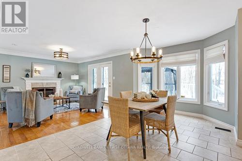 208 Bay Road, Rideau Lakes, ON - Indoor Photo Showing Dining Room With Fireplace