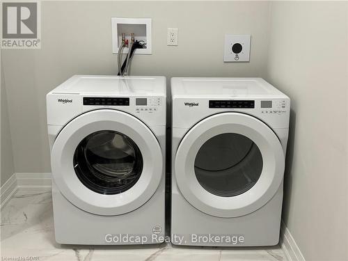 203 - 71 Wyndham Street S, Guelph (Two Rivers), ON - Indoor Photo Showing Laundry Room