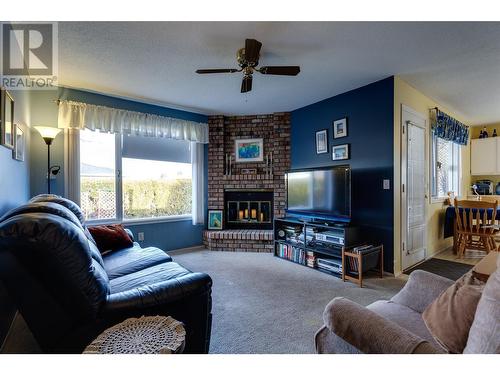 Family Room/Den w/Fireplace - 1260 Raymer Avenue Unit# 397, Kelowna, BC - Indoor Photo Showing Living Room With Fireplace