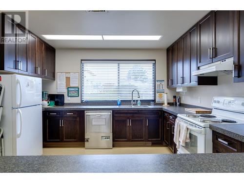 Community Center -Kitchen - 1260 Raymer Avenue Unit# 397, Kelowna, BC - Indoor Photo Showing Kitchen