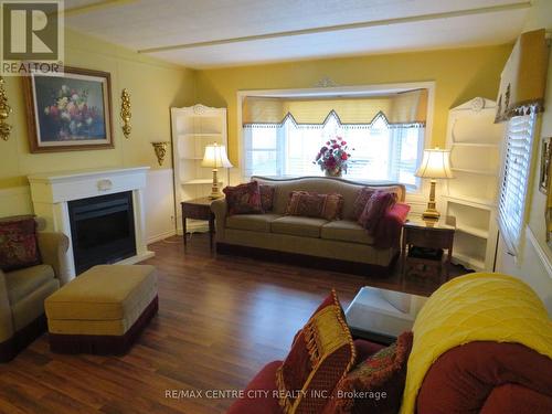 56 - 198 Springbank Drive, London, ON - Indoor Photo Showing Living Room With Fireplace