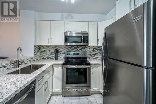 707 - 2177 Burnhamthorpe Road W, Mississauga, ON - Indoor Photo Showing Kitchen With Double Sink With Upgraded Kitchen