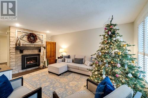 3 - 1501 Upper Middle Road, Burlington, ON - Indoor Photo Showing Living Room With Fireplace