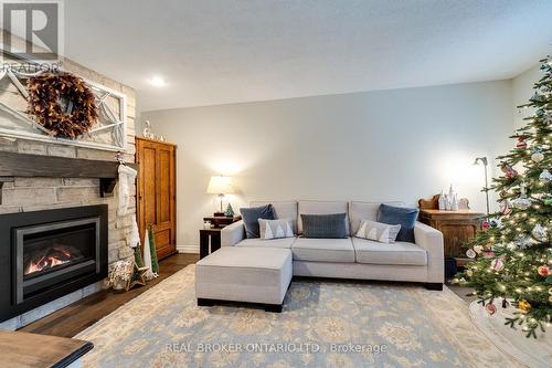 3 - 1501 Upper Middle Road, Burlington, ON - Indoor Photo Showing Living Room With Fireplace