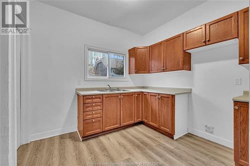 1060-1062 Pelissier, Windsor, ON - Indoor Photo Showing Kitchen With Double Sink