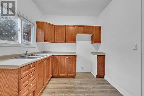 1060-1062 Pelissier, Windsor, ON - Indoor Photo Showing Kitchen With Double Sink