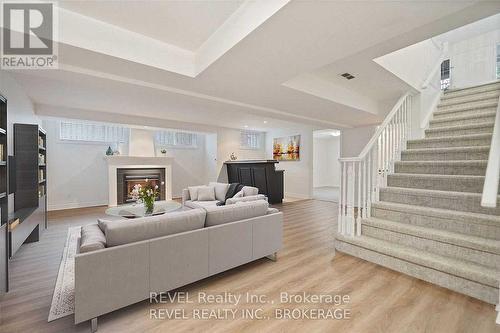 6839 Imperial Court, Niagara Falls, ON - Indoor Photo Showing Living Room With Fireplace