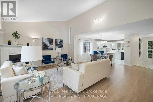 6839 Imperial Court, Niagara Falls, ON - Indoor Photo Showing Living Room With Fireplace