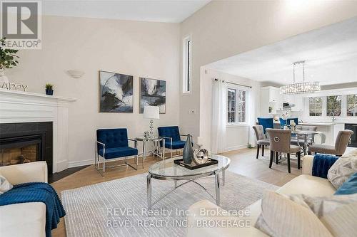 6839 Imperial Court, Niagara Falls, ON - Indoor Photo Showing Living Room With Fireplace