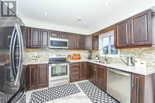 20 - 4950 Albina Way, Mississauga, ON - Indoor Photo Showing Kitchen With Double Sink