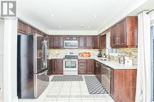 20 - 4950 Albina Way, Mississauga, ON - Indoor Photo Showing Kitchen With Double Sink