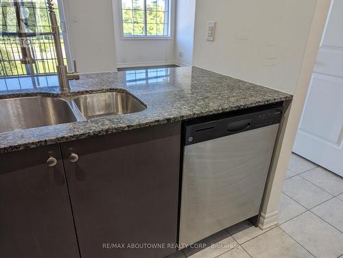 332 - 2300 Upper Middle Road W, Oakville, ON - Indoor Photo Showing Kitchen With Double Sink