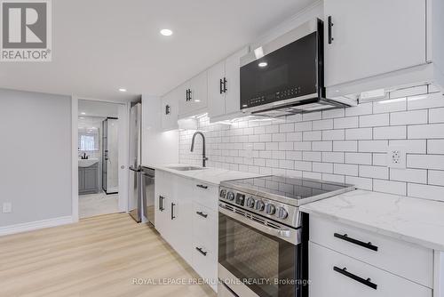 4 - 79 Twenty Fifth Street, Toronto, ON - Indoor Photo Showing Kitchen With Upgraded Kitchen