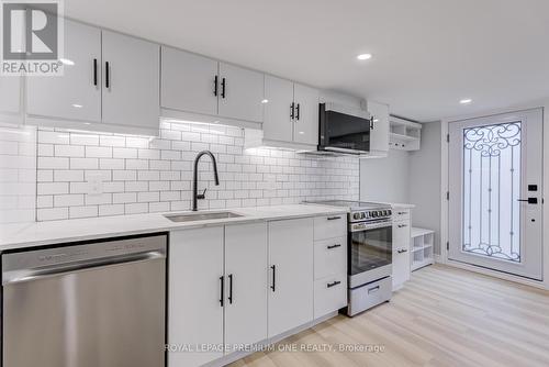 4 - 79 Twenty Fifth Street, Toronto, ON - Indoor Photo Showing Kitchen With Upgraded Kitchen